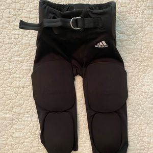 Adidas Youth Med Football Padded Pants.  Adjustable waist. Very Good condition.